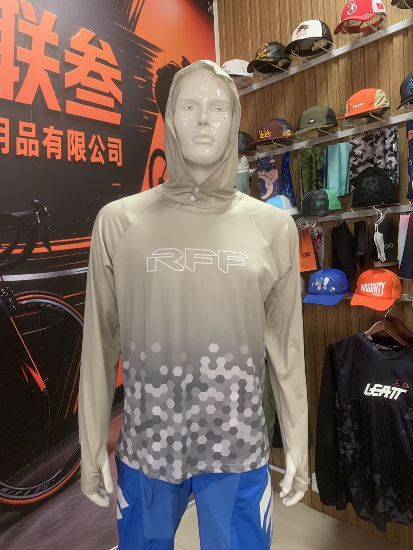 Front view of a custom hooded fishing shirt produced for a Polish customer event